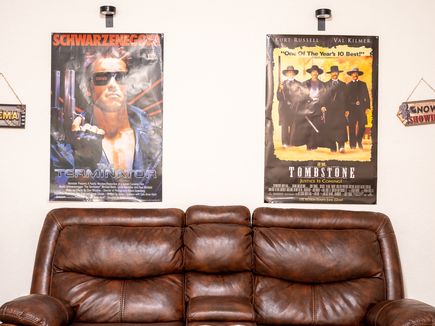 Sink into plush leather seating in your own private screening room, where iconic movie posters set the stage for cozy nights in.