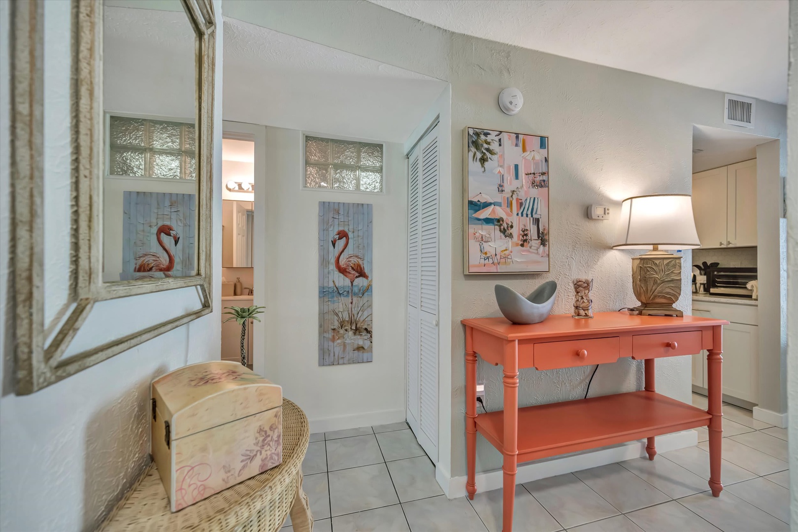 Step into your bright, welcoming retreat with coastal charm and playful pops of color to set a cheerful vacation mood from the moment you arrive.