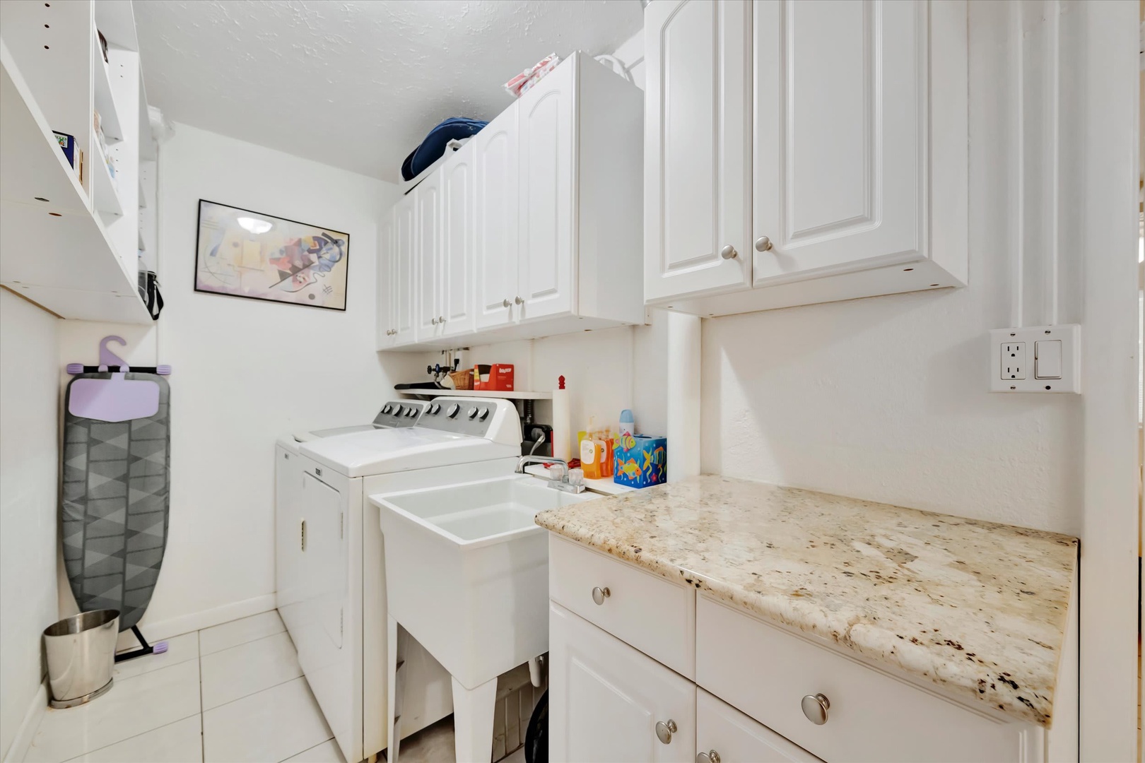 Your dedicated laundry room makes it easy to keep everything fresh during your stay, with a full-size washer and plenty of cabinet space for supplies.