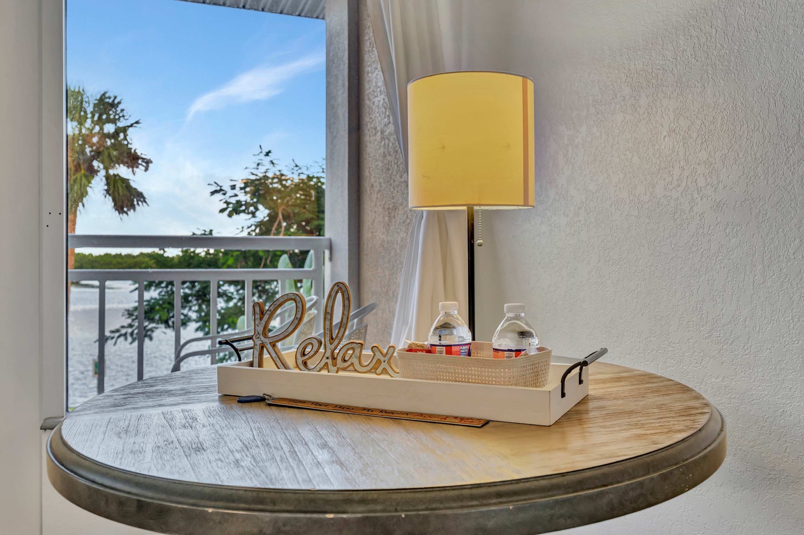 Unwind at your private bedside table, where fresh water awaits and serene lake views promise peaceful mornings and evenings.