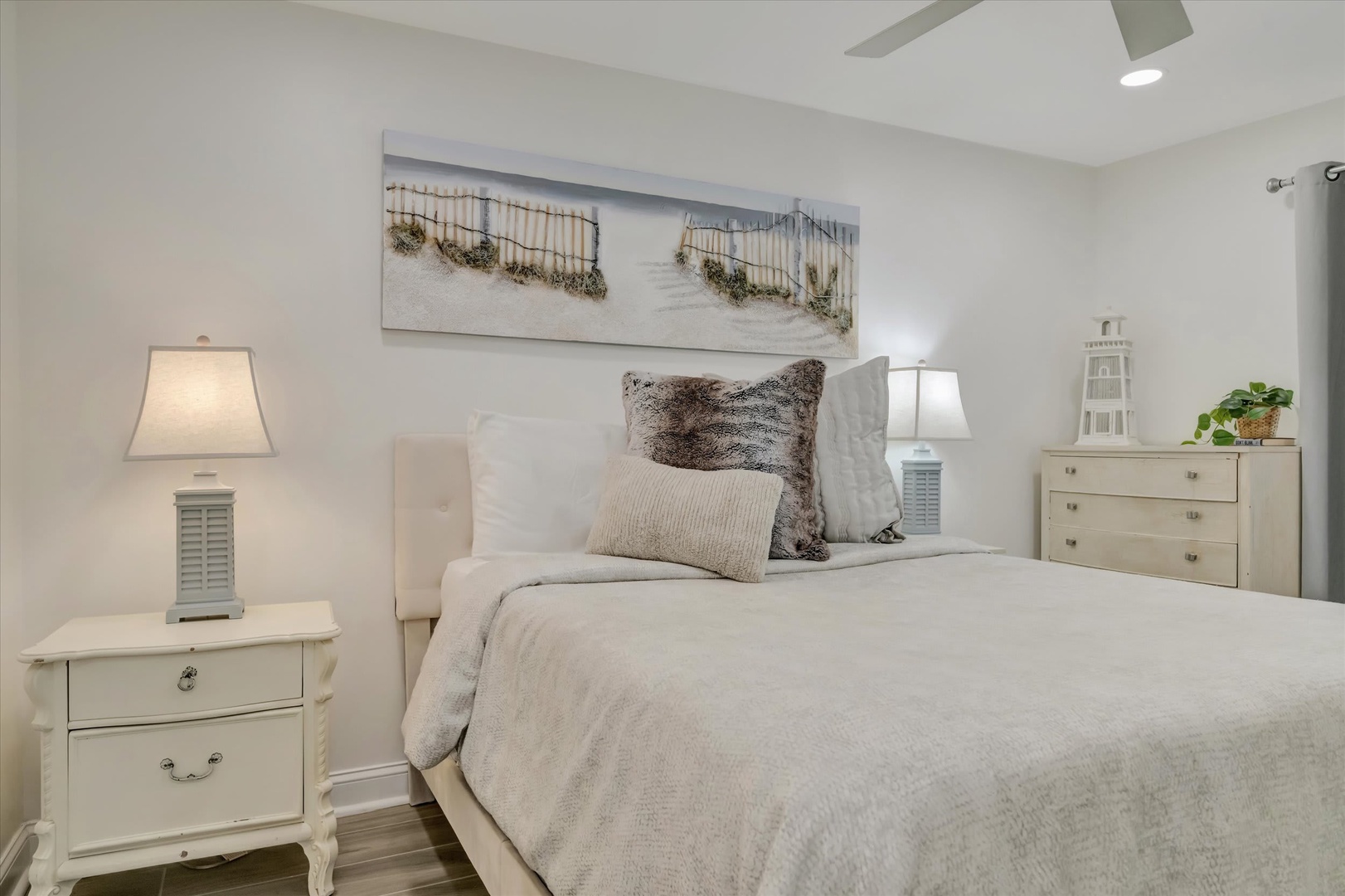 Drift off to sleep in your serene coastal bedroom, where soft linens and gentle beach-inspired décor create a peaceful retreat after your day of exploration.