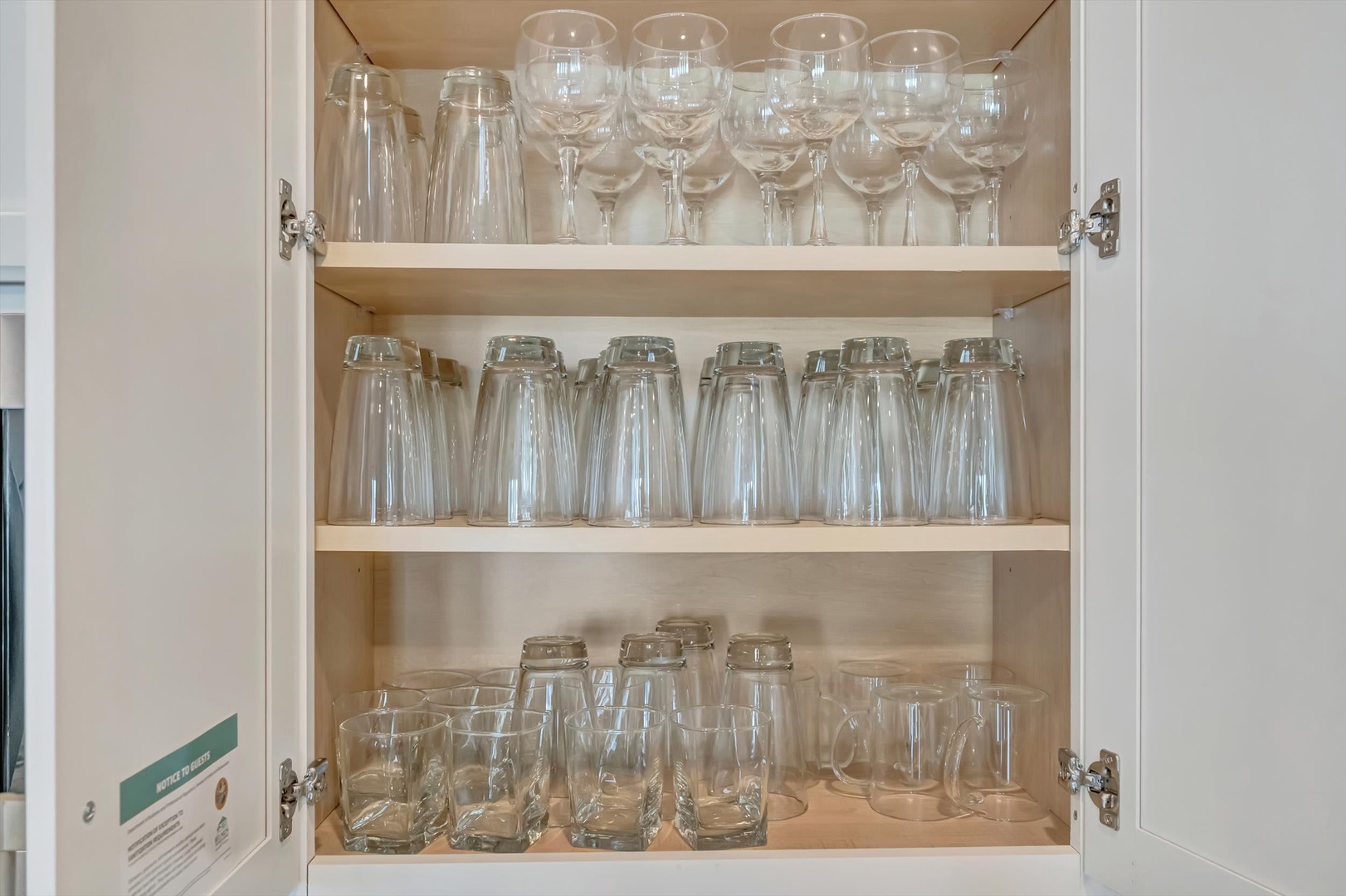 Your kitchen is fully stocked with glassware for every occasion—wine glasses, tumblers, and more—making it easy to enjoy meals and drinks with family and friends.