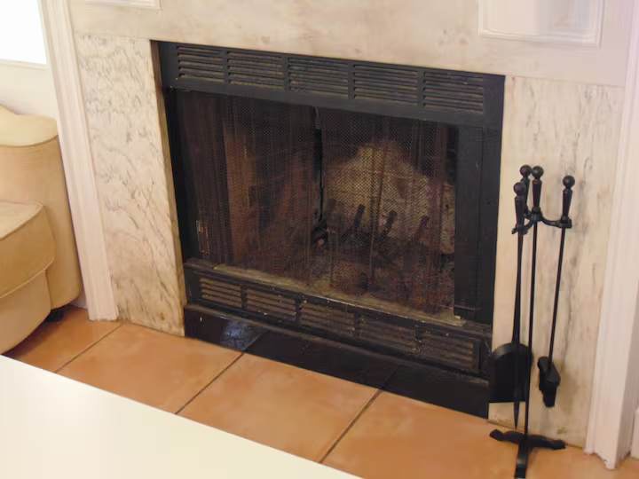 Cozy up by your private fireplace—perfect for relaxing evenings after exploring the area.
