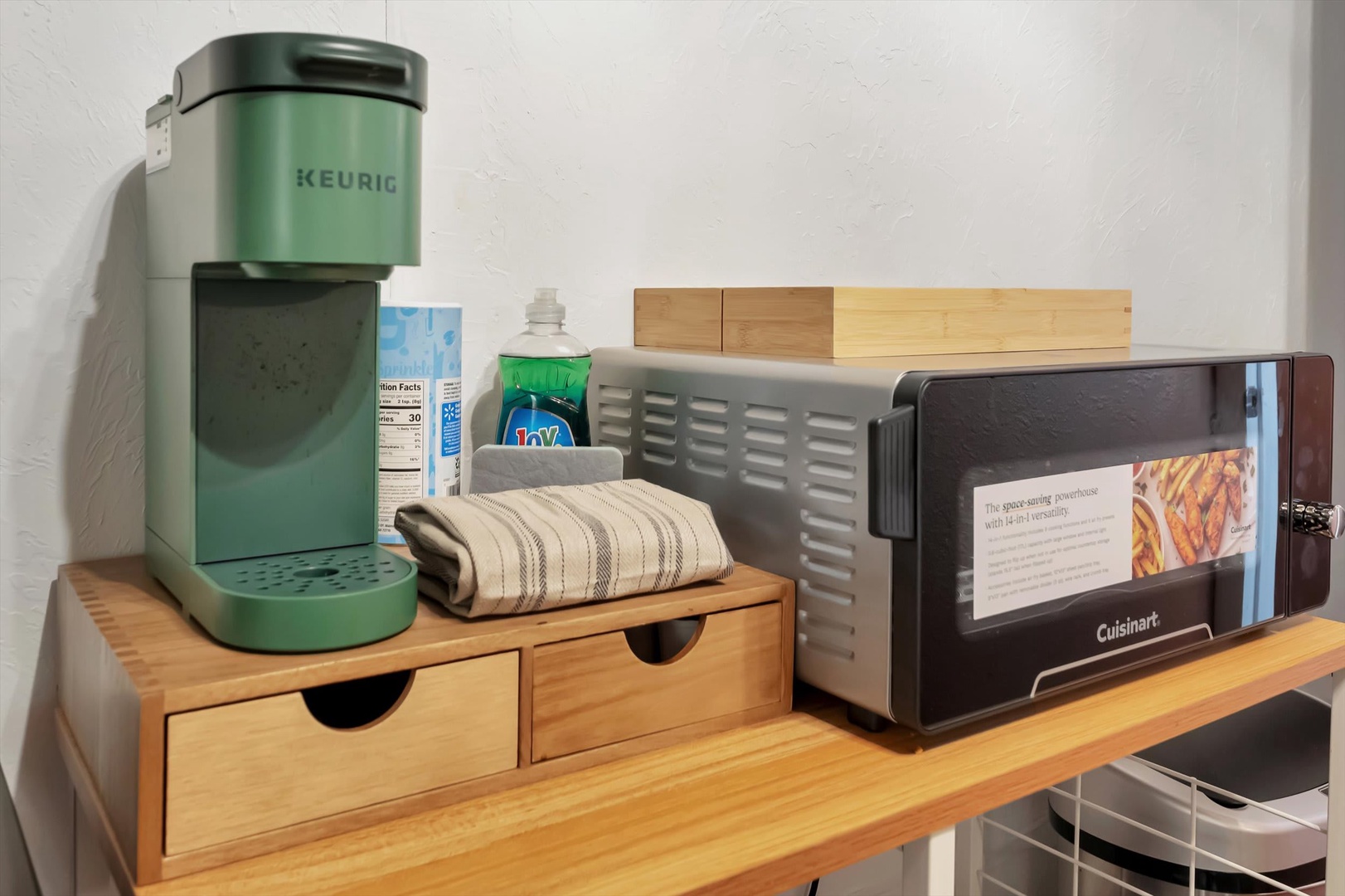 Your morning routine starts here—brew a fresh cup and heat up breakfast with the convenient kitchenette setup, stocked and ready for your convenience.