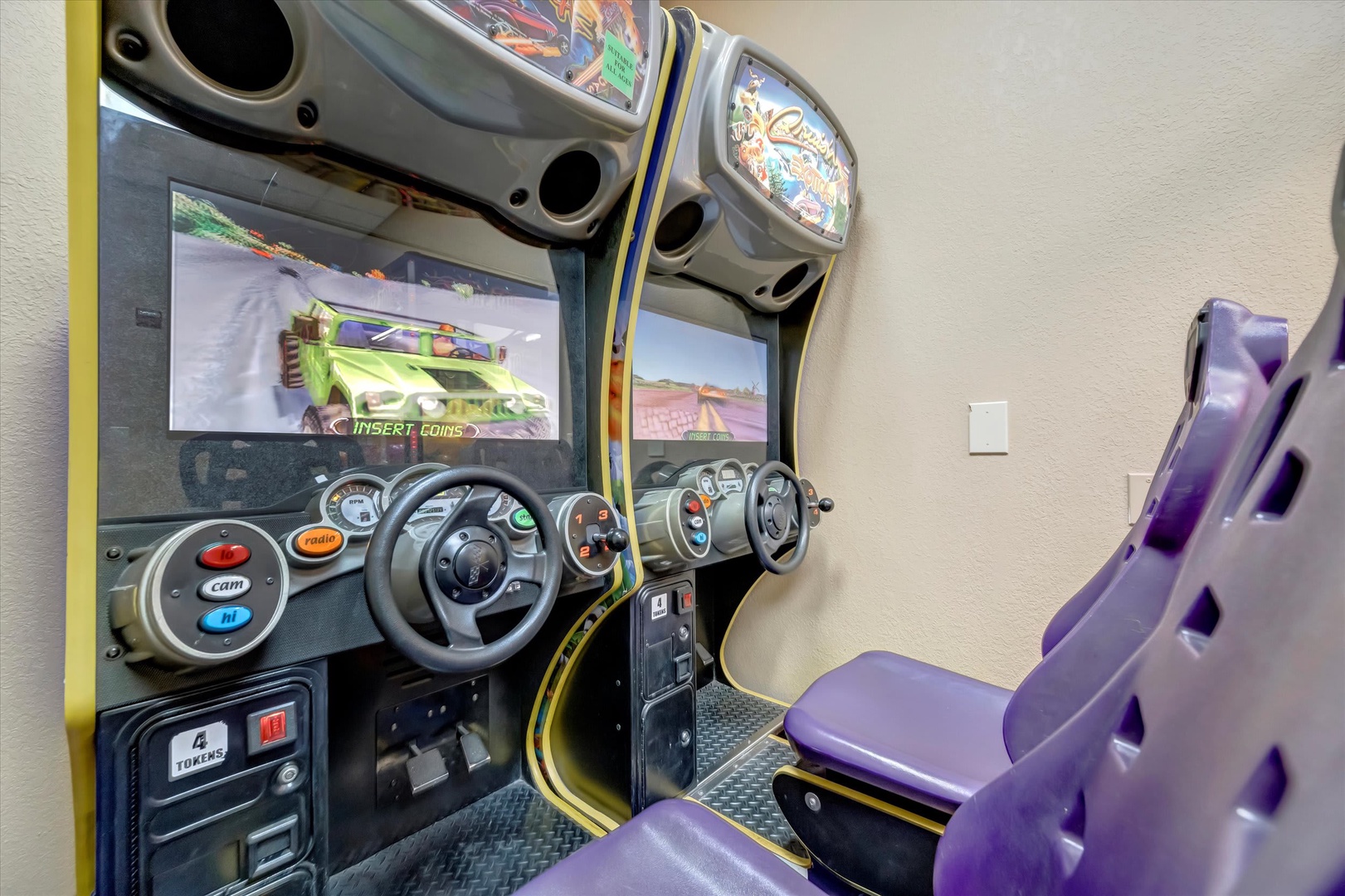 Challenge your group to a thrilling race on these authentic arcade racing games, complete with immersive steering wheels and vibrant racing seats for hours of entertainment.