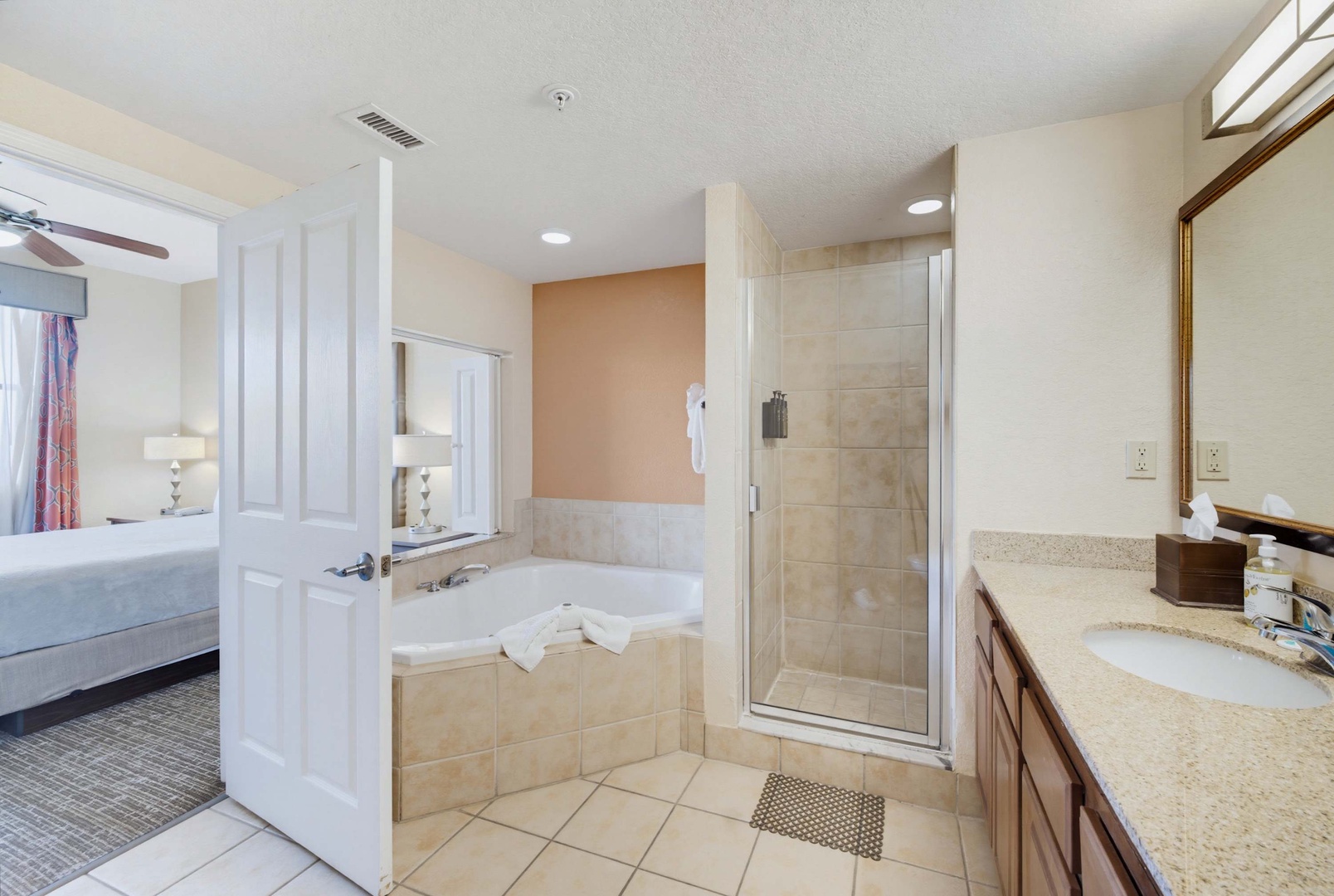Step into your private retreat where a soaking tub and walk-in shower await after your adventures. Soft lighting and warm tones create a spa-like haven for unwinding at day's end.