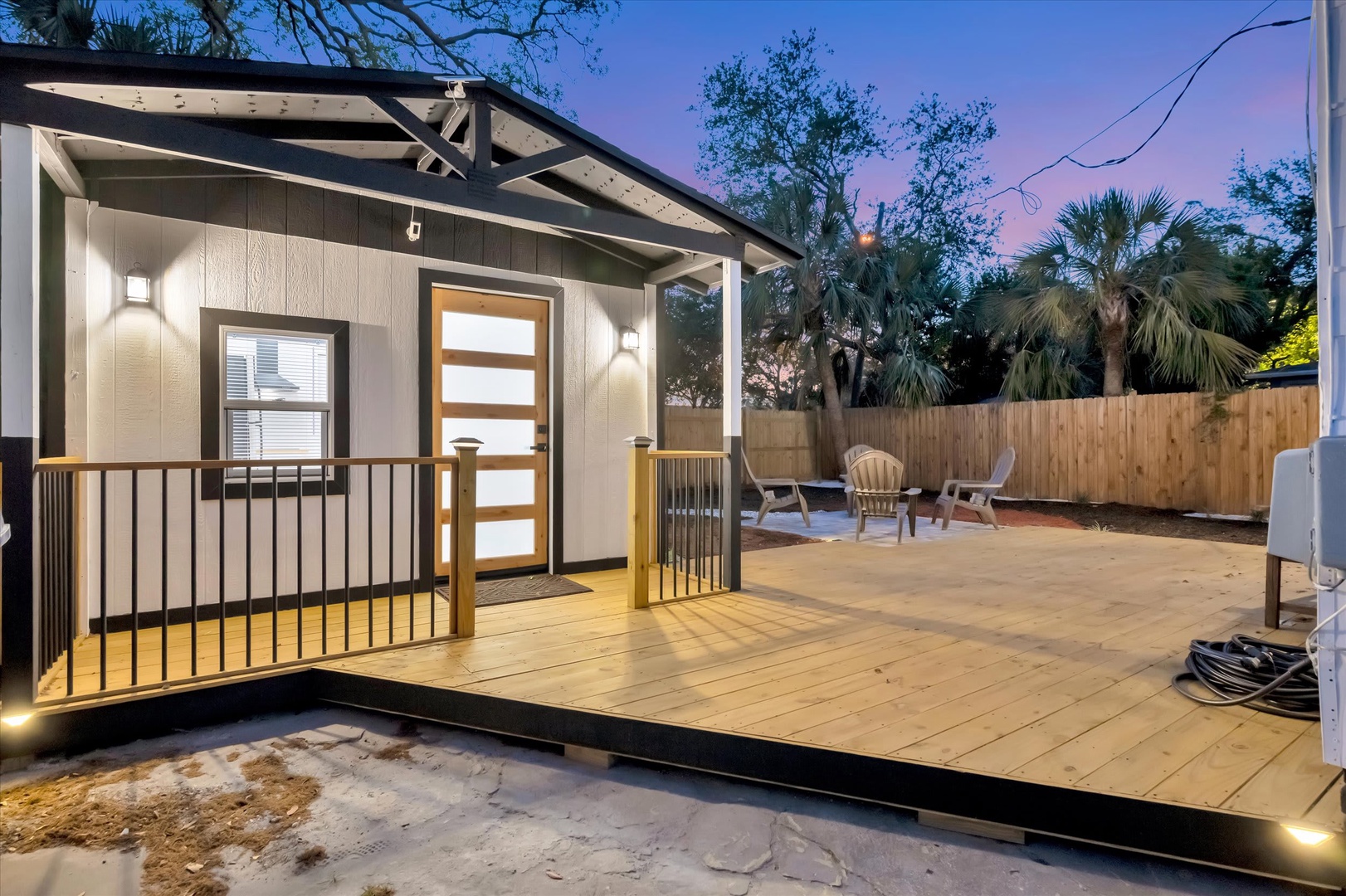 Step onto your private deck and patio as twilight paints the sky—perfect for evening gatherings under the palms or peaceful mornings with coffee in hand.