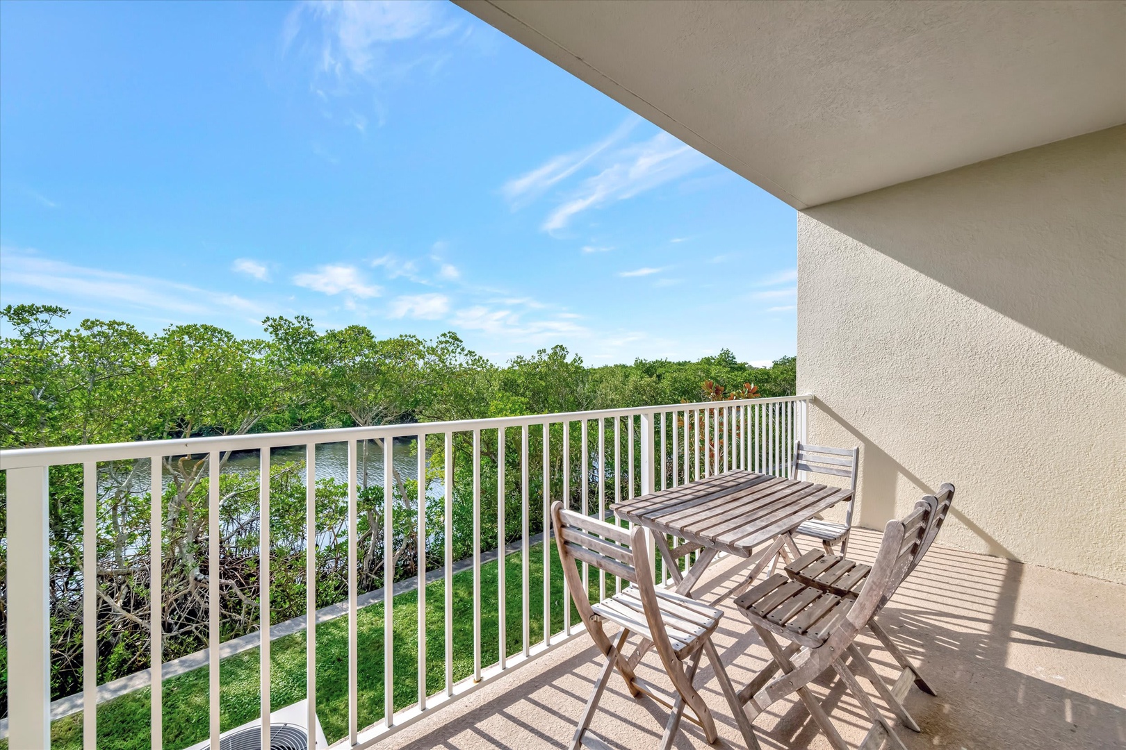 Step out to your private balcony and take in sweeping views of lush mangroves and open sky—a peaceful spot to enjoy morning coffee or unwind after a day of exploring.