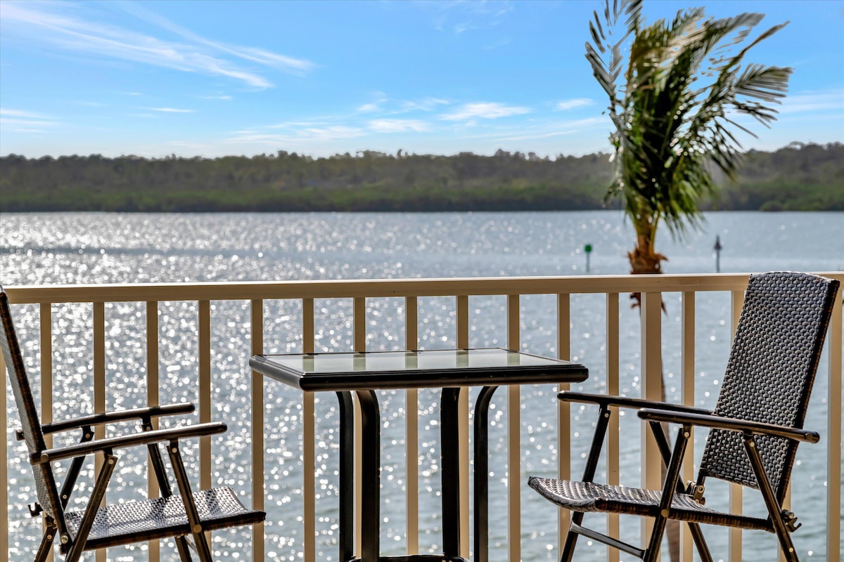 Picture yourself sipping your morning coffee here, with sunlight dancing across the water and a gentle breeze rustling through the palms—your perfect waterfront retreat awaits.