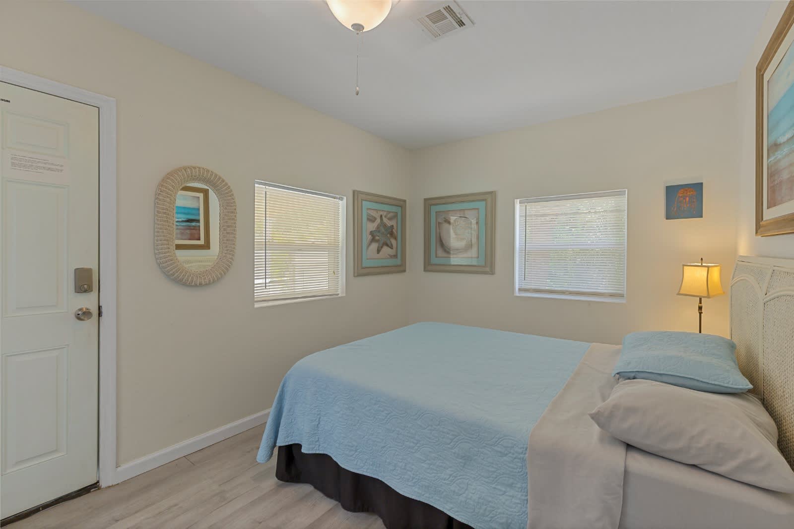 Step into your serene bedroom retreat, where soft coastal tones and gentle natural light create the perfect atmosphere for restful nights. The beach-inspired decor invites you to unwind after your sunny adventures.
