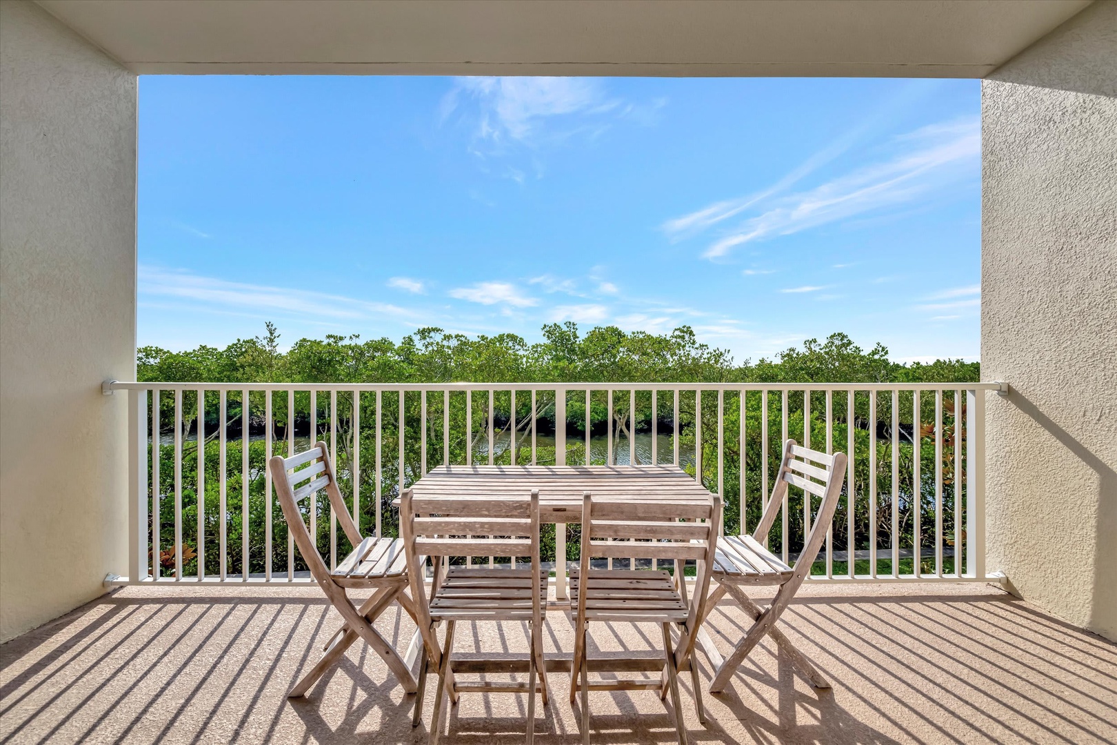 Step out onto your private balcony and soak in peaceful views of lush greenery and open sky. This inviting outdoor space is perfect for morning coffee or evening relaxation under the Florida sun.