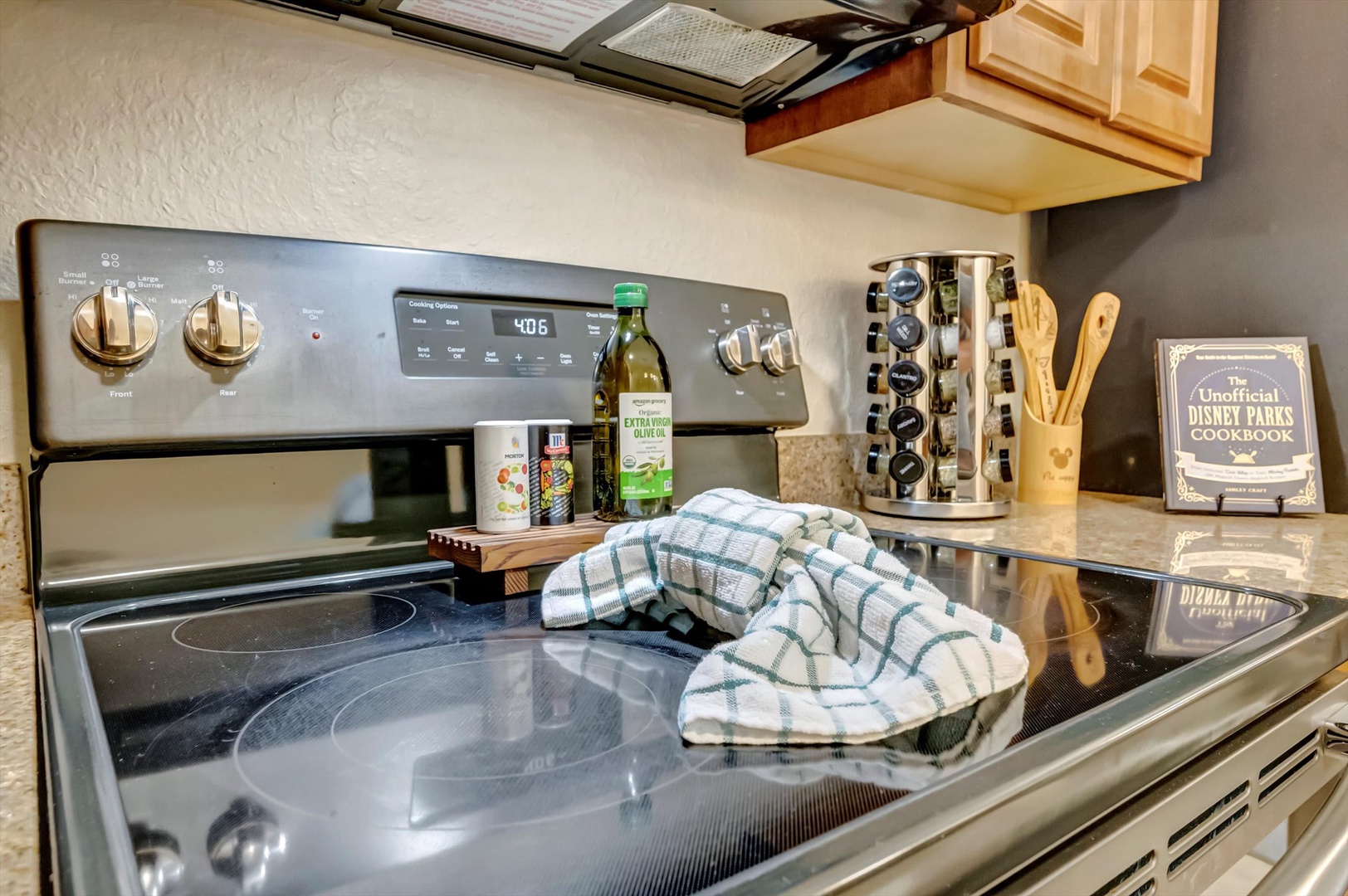 Step into your fully equipped kitchen with a sleek stove and range hood, ready for you to whip up anything from morning pancakes to vacation feasts.