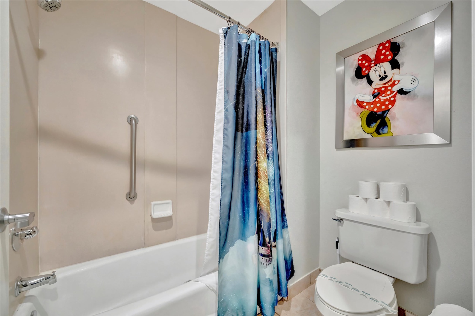 Your bathroom features a tub-shower combination and playful touches that make it feel welcoming and fresh. Clean, bright, and ready for your stay.