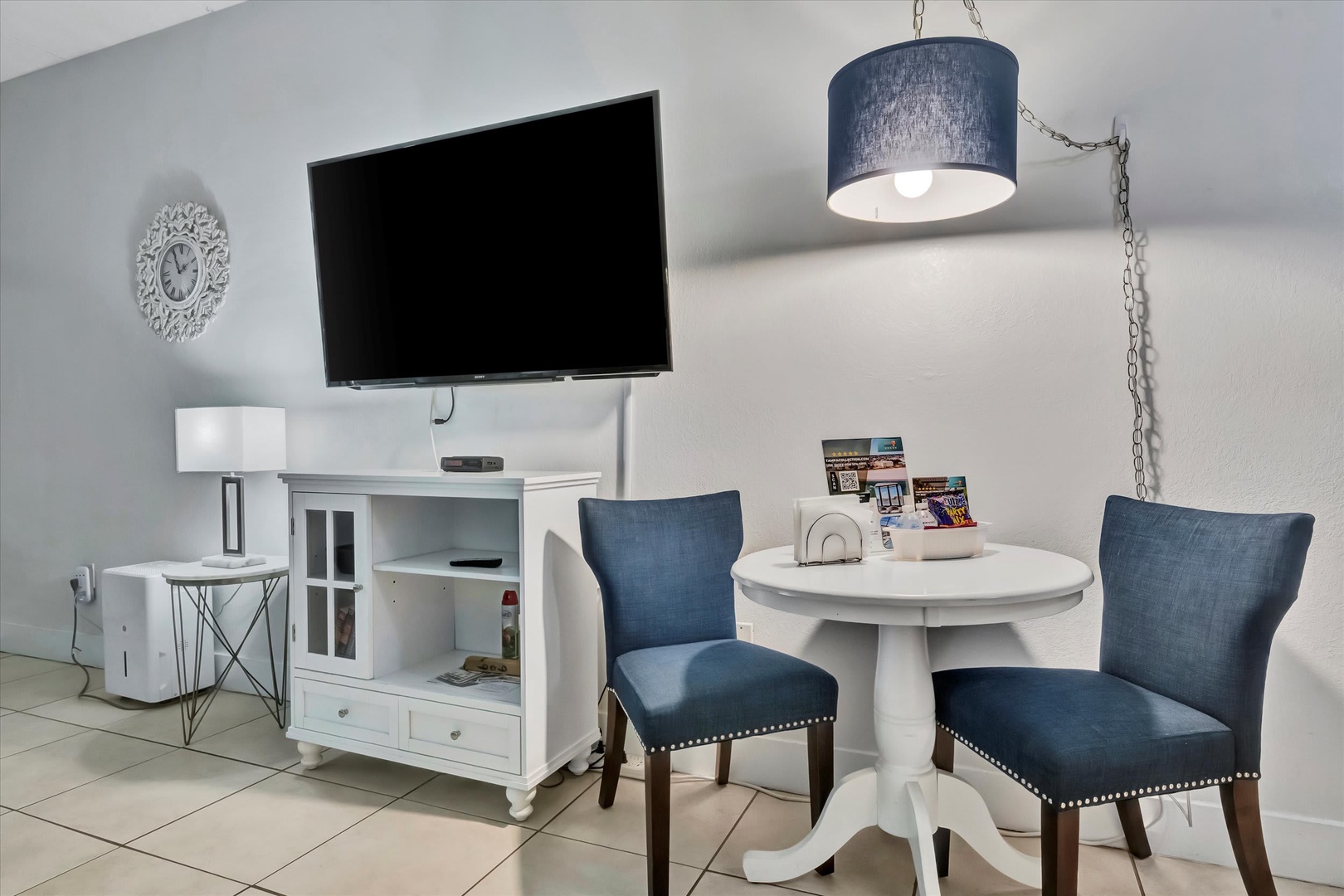 Relax in your own coastal-chic living space, complete with plush seating, a stylish dining nook, and modern entertainment—all designed to make you feel right at home.
