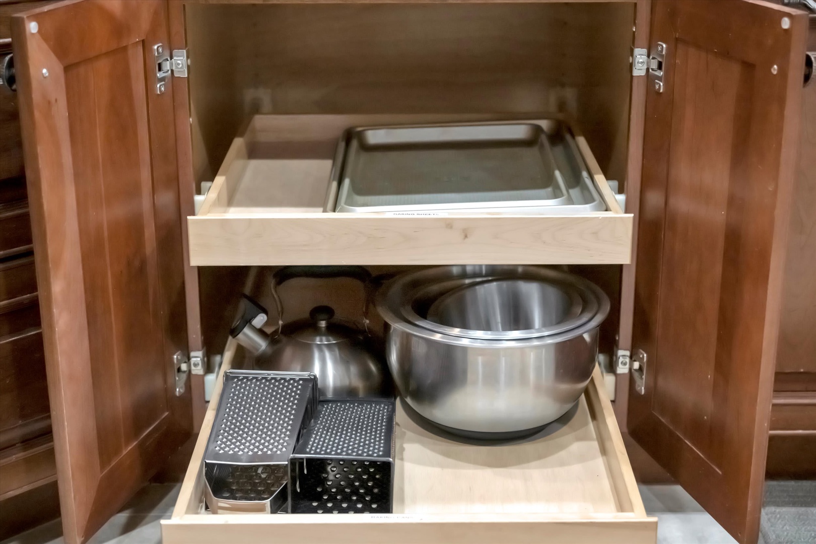 Pull out these smooth-gliding kitchen drawers and find everything you need—a kettle for your morning coffee, quality cookware, and handy graters—ready to help you whip up your favorite meals in comfort.