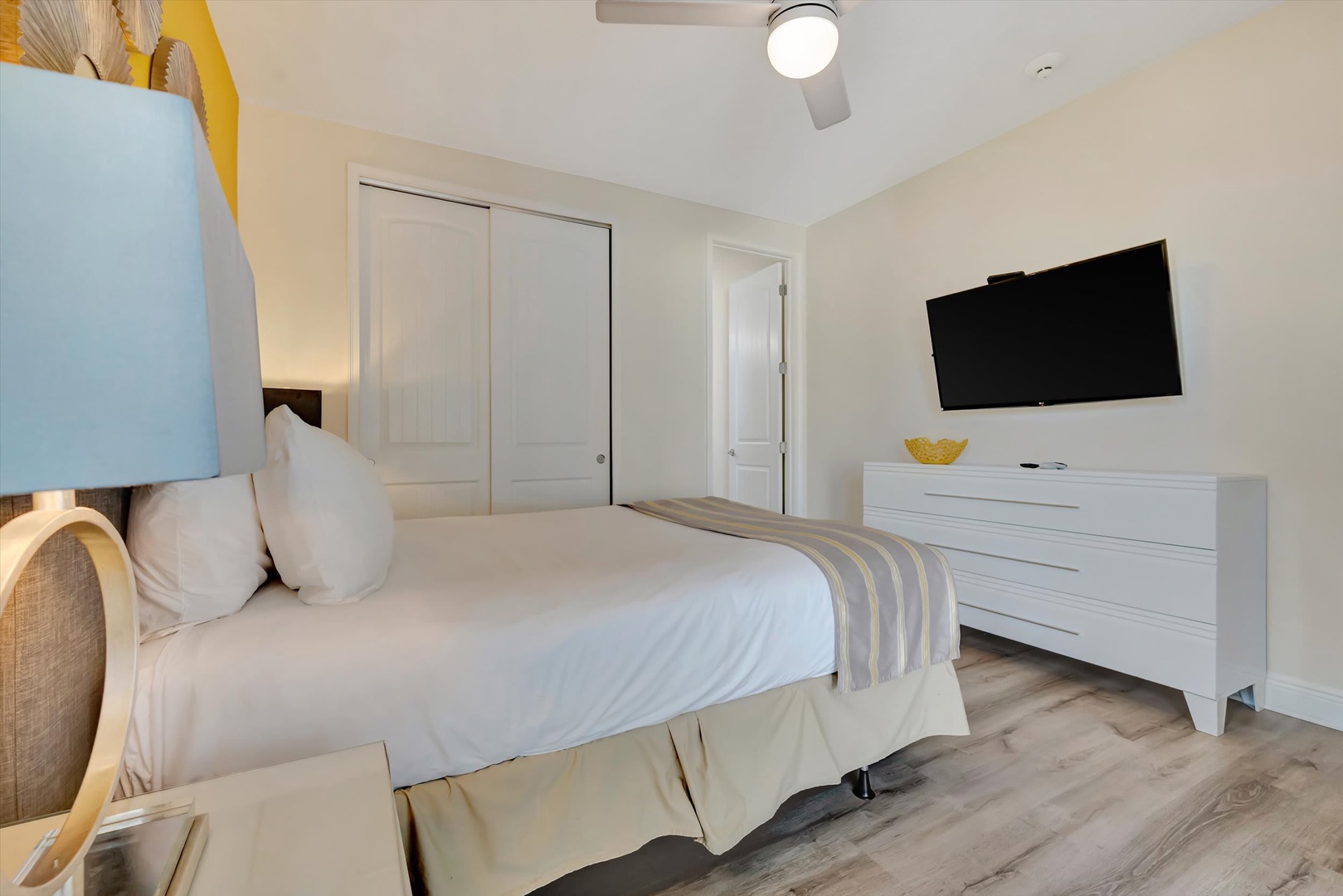 Drift into peaceful sleep in your tranquil bedroom, featuring crisp linens, ample storage, and entertainment when you want it.