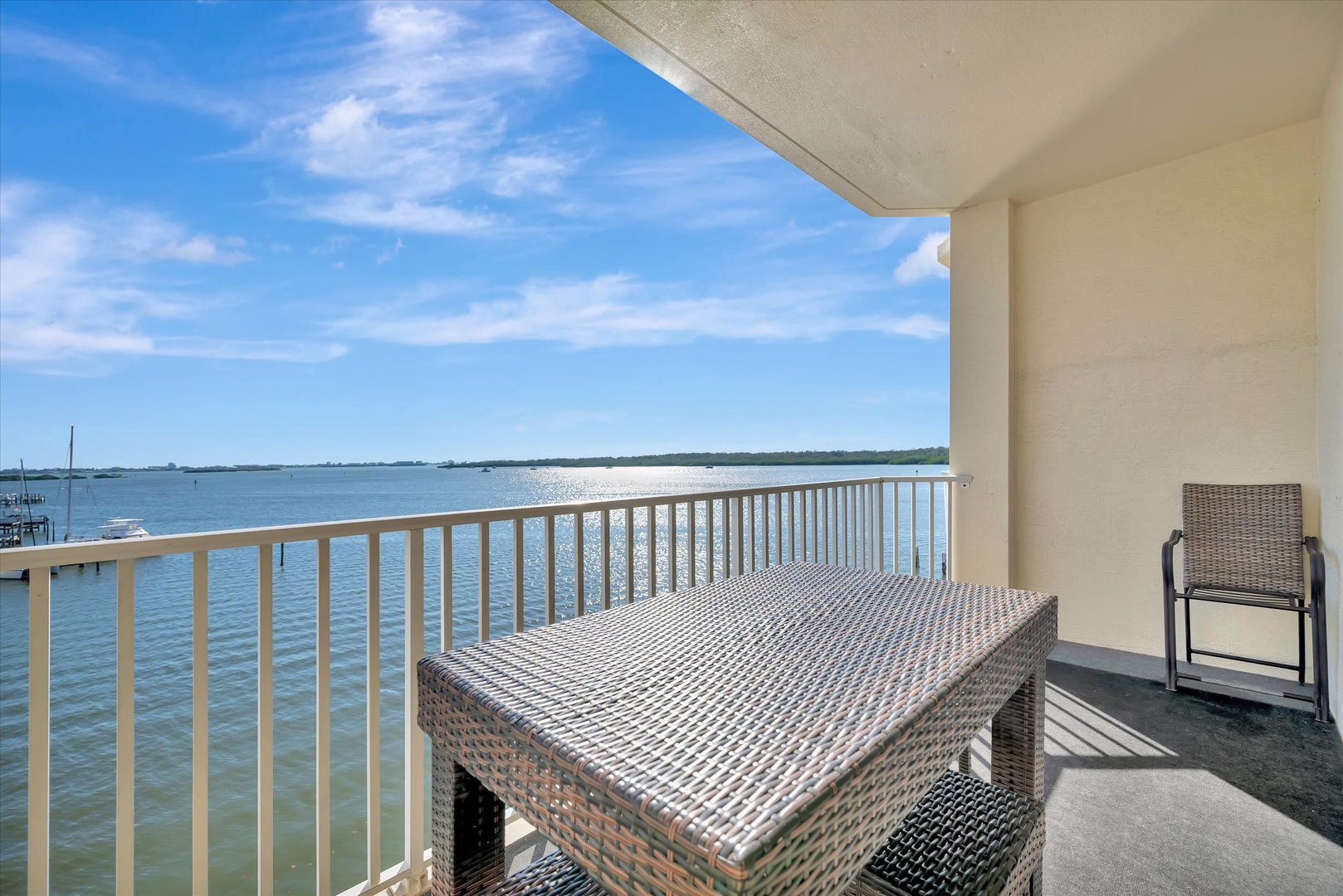 Step out onto your private balcony and let the waterfront views take your breath away. Sip morning coffee or evening cocktails while watching sunlight dance across the calm waters stretching to the horizon.