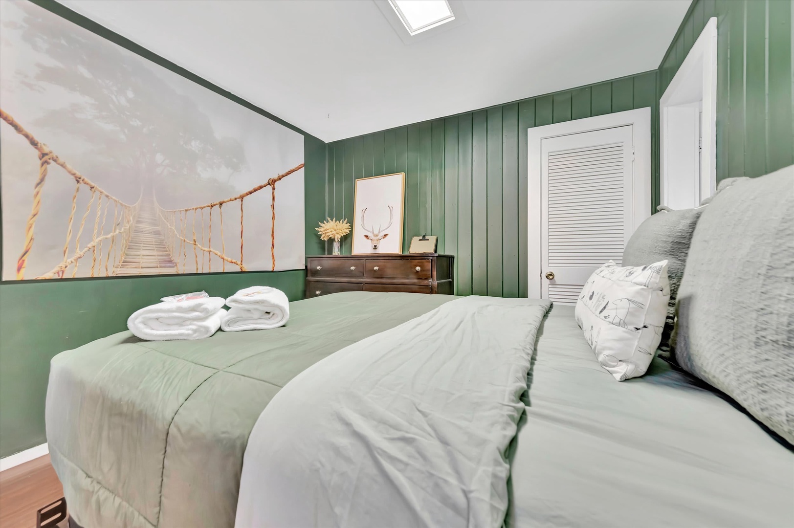 Sink into the plush bedding and let the calming green tones soothe you after a day of adventure. Fresh towels and thoughtful touches make this space feel like your own retreat.