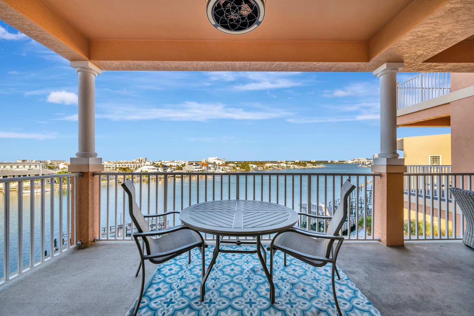 Sip your morning coffee on this waterfront balcony while you soak in sweeping views of the calm bay and surrounding coastal charm.