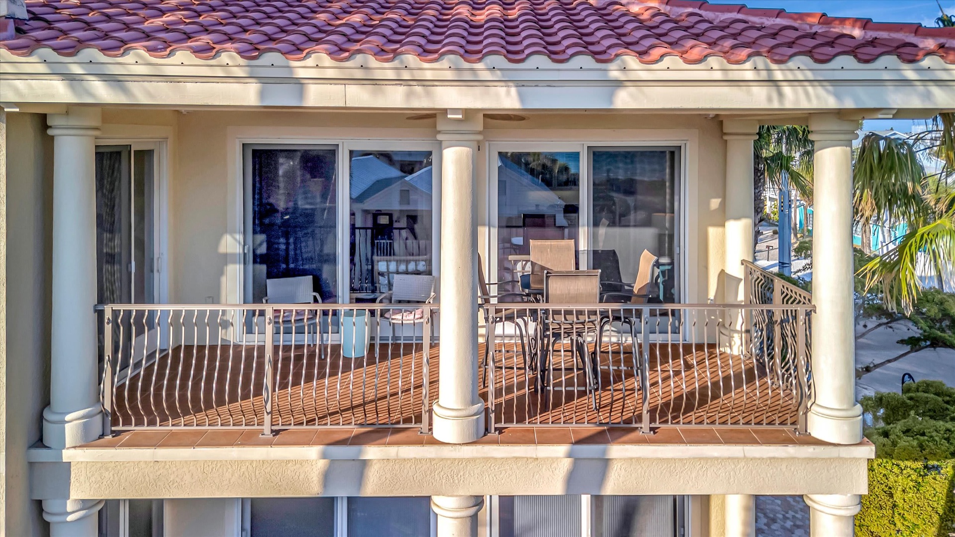 Step out onto your private second-floor balcony, where morning coffee or sunset cocktails come with warm coastal breezes and palm-lined views that set the perfect vacation mood.