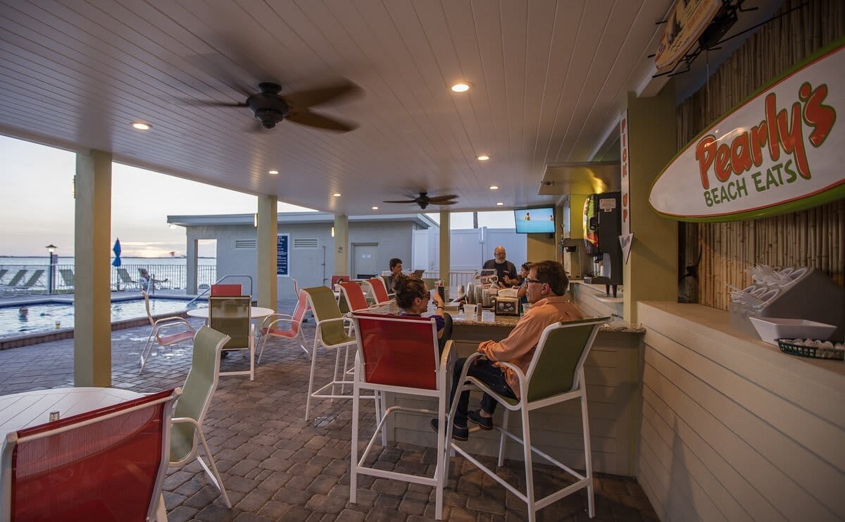 The property offers a covered poolside dining area where you can enjoy casual meals and refreshments without leaving the comfort of your vacation retreat.