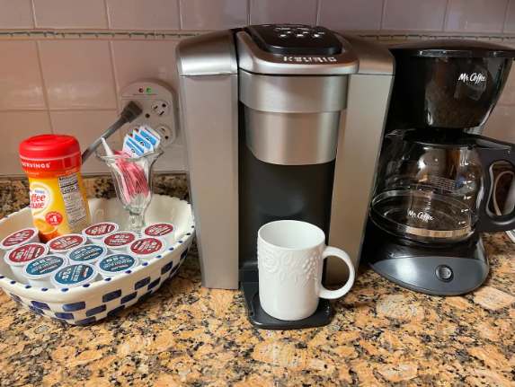 Wake up to your choice of fresh-brewed coffee—both single-serve and traditional coffee makers are ready for you, along with a selection of pods and sweeteners to start your morning just right.