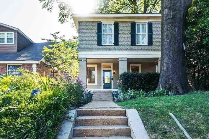 This charming home welcomes you with classic architecture, a tree-shaded yard, and a peaceful residential setting perfect for your getaway.