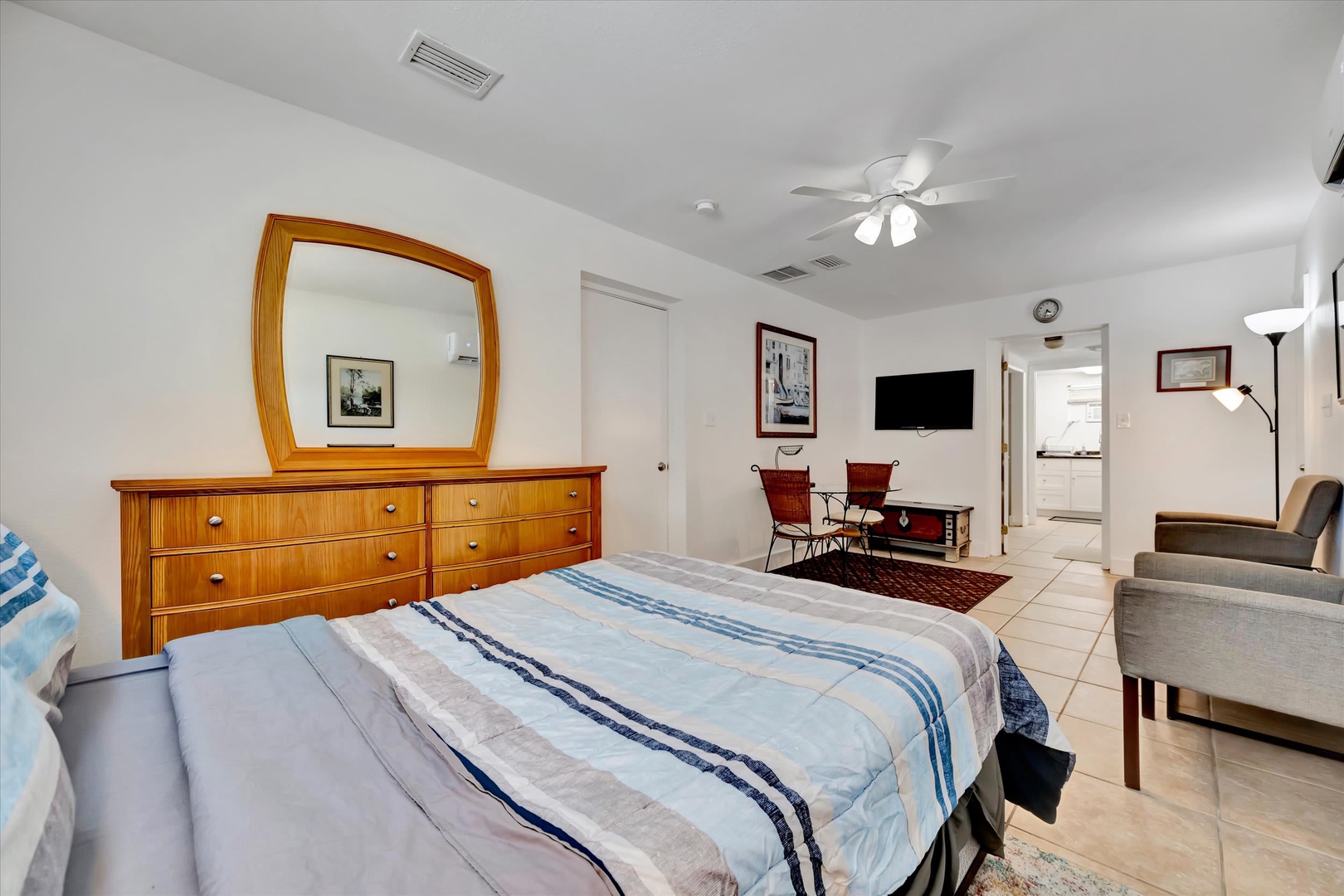 Your bright, spacious retreat features a cozy bed, thoughtful seating, and modern touches—perfect for unwinding after a day of adventure.