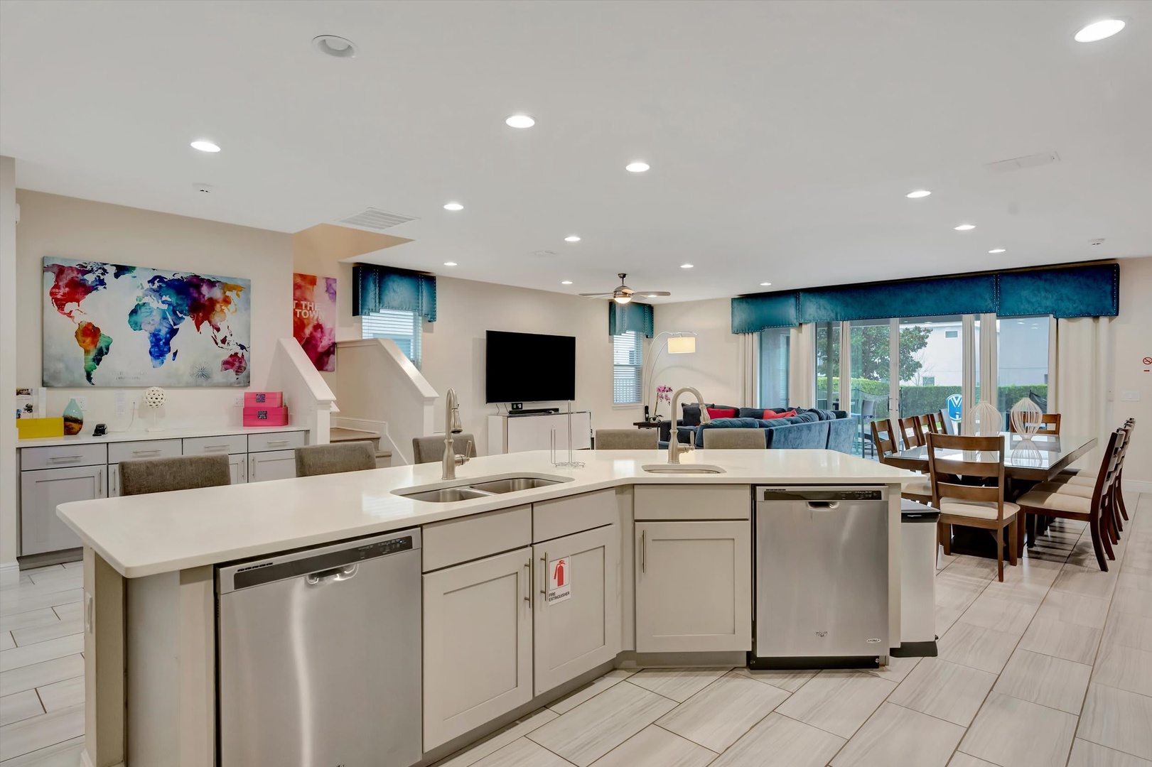 Gather with family in your spacious, open-concept retreat where a chef-ready kitchen flows seamlessly into comfortable living and dining spaces, all bathed in natural light.