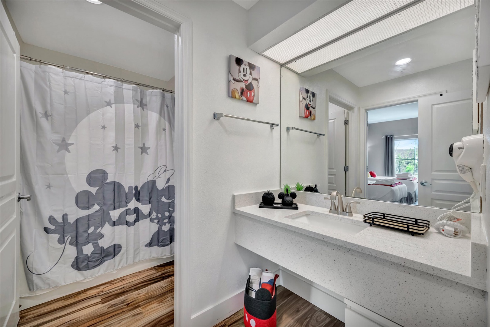 Step into your bright, spotless bathroom where fun meets function—think fresh towels, a spacious vanity, and playful touches that make getting ready a breeze.