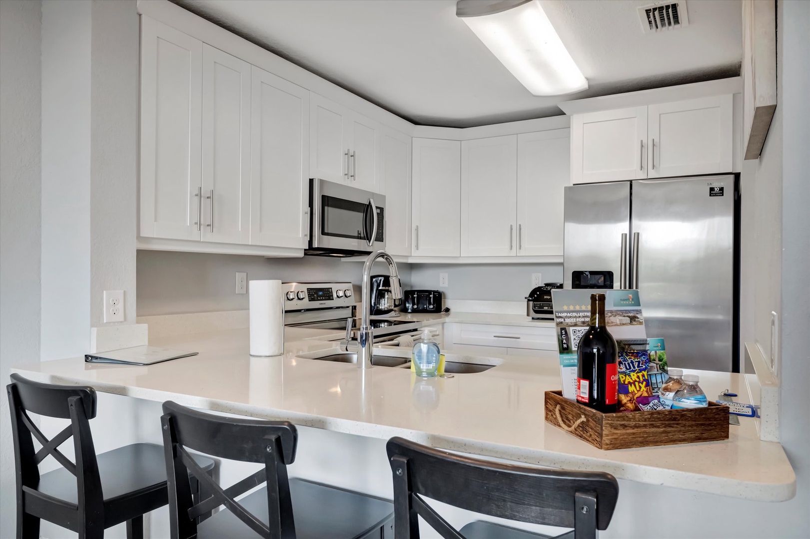 Your bright, fully equipped kitchen makes meal prep a breeze with modern appliances and plenty of counter space for cooking up your favorite vacation dishes.