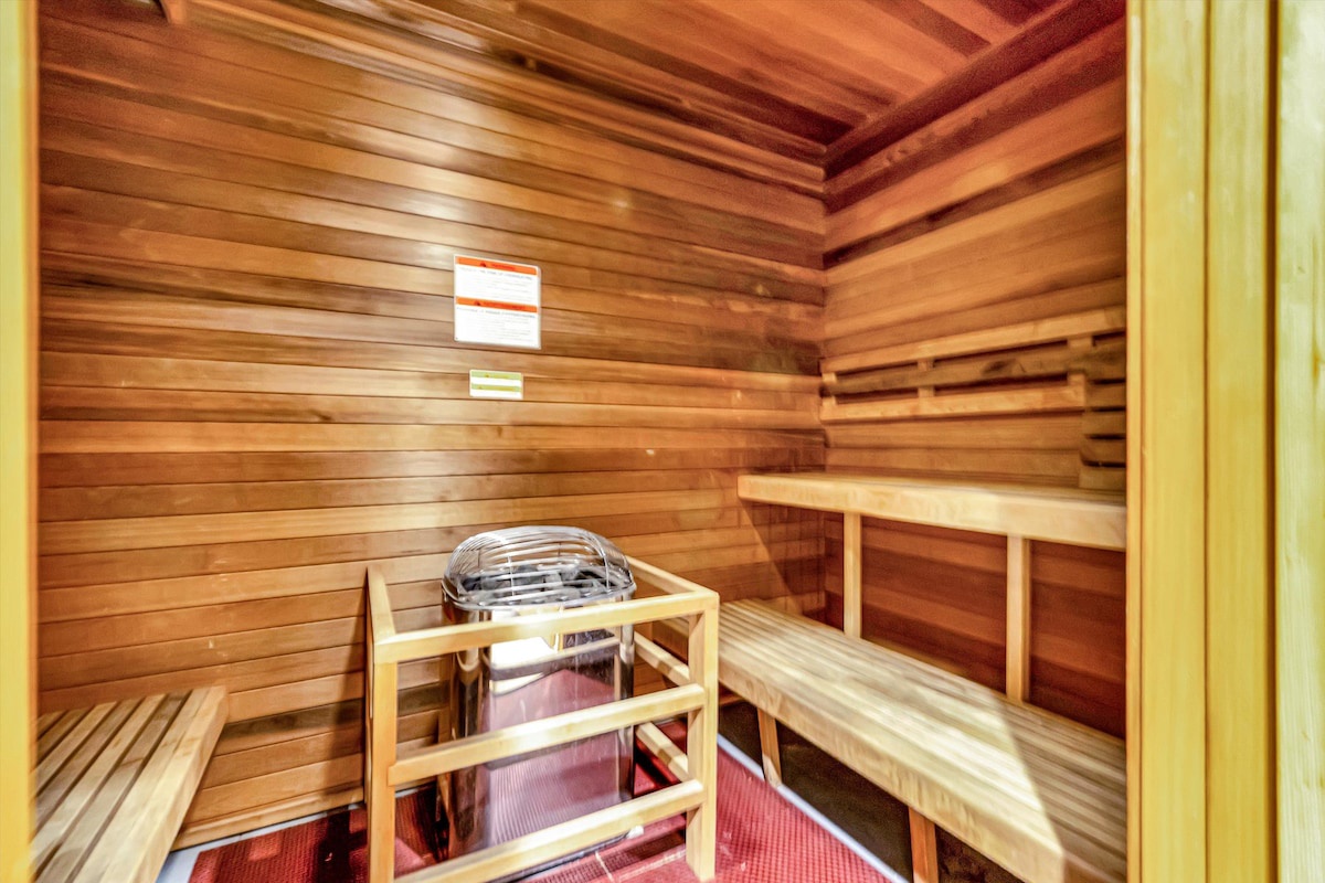 Indulge in ultimate relaxation in your private sauna. Warm cedar wood surrounds you on tiered benches, ready to melt away stress and soothe tired muscles after a day exploring.