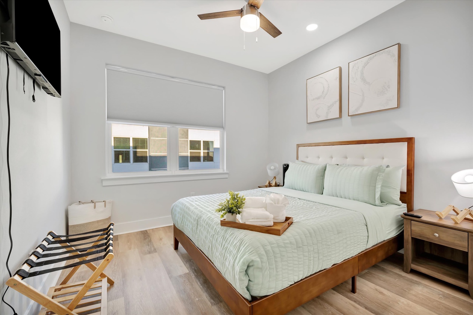 Sink into a restful night in your serene bedroom, where soft linens, calming tones, and a gentle ceiling fan create the perfect retreat after a day of adventure.