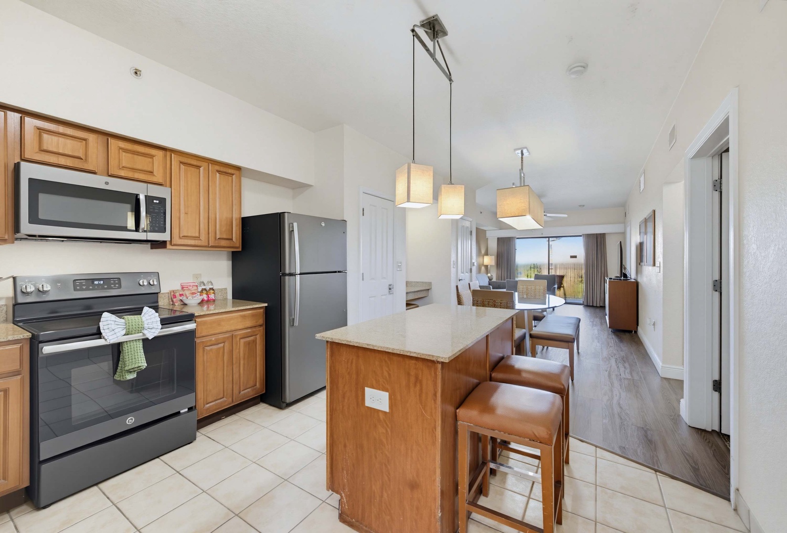 Cook together at your inviting kitchen island, then settle into the bright living space beyond—perfect for evenings of relaxation after desert adventures.
