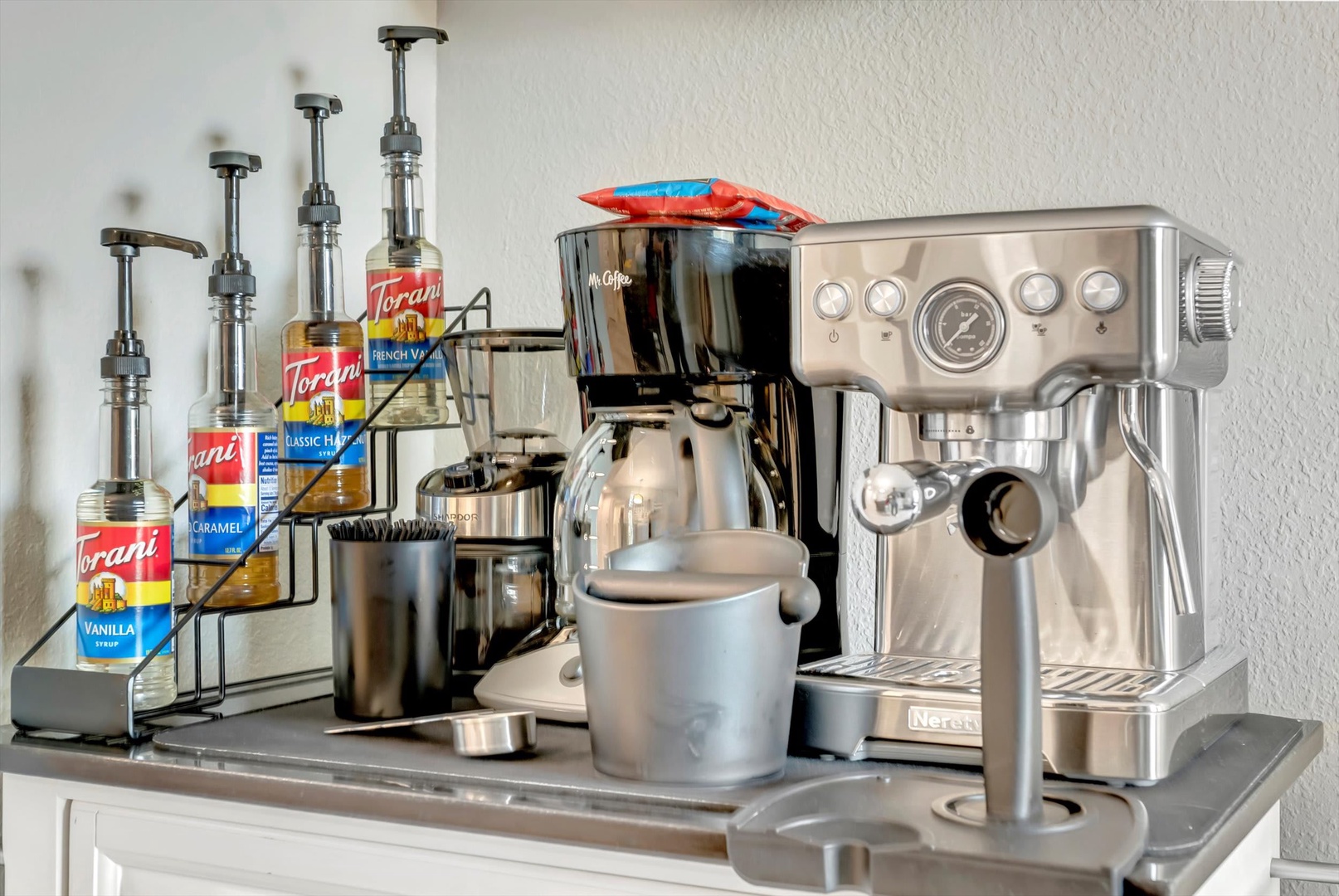 Start your mornings right with a premium espresso machine and barista-quality coffee station. Create your perfect cup with flavored syrups and all the tools you need for café-style beverages.