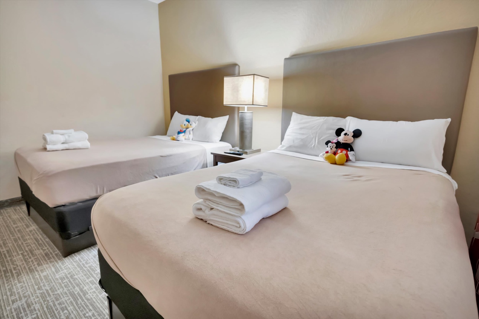 Settle into your perfectly appointed bedroom with plush beds, crisp linens, and thoughtful touches throughout. Fresh towels await, and there's plenty of space for your whole crew to unwind after a day of adventure.