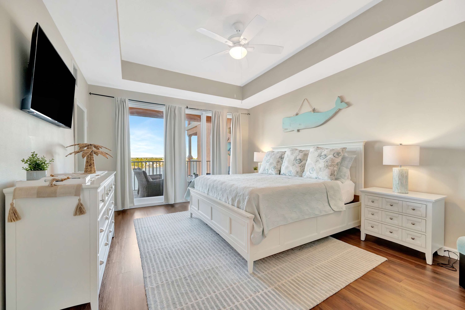 Drift off in your serene coastal bedroom, where soft linens and gentle sea breezes from your private balcony create the perfect escape. Wake to morning light and step outside to greet the day.