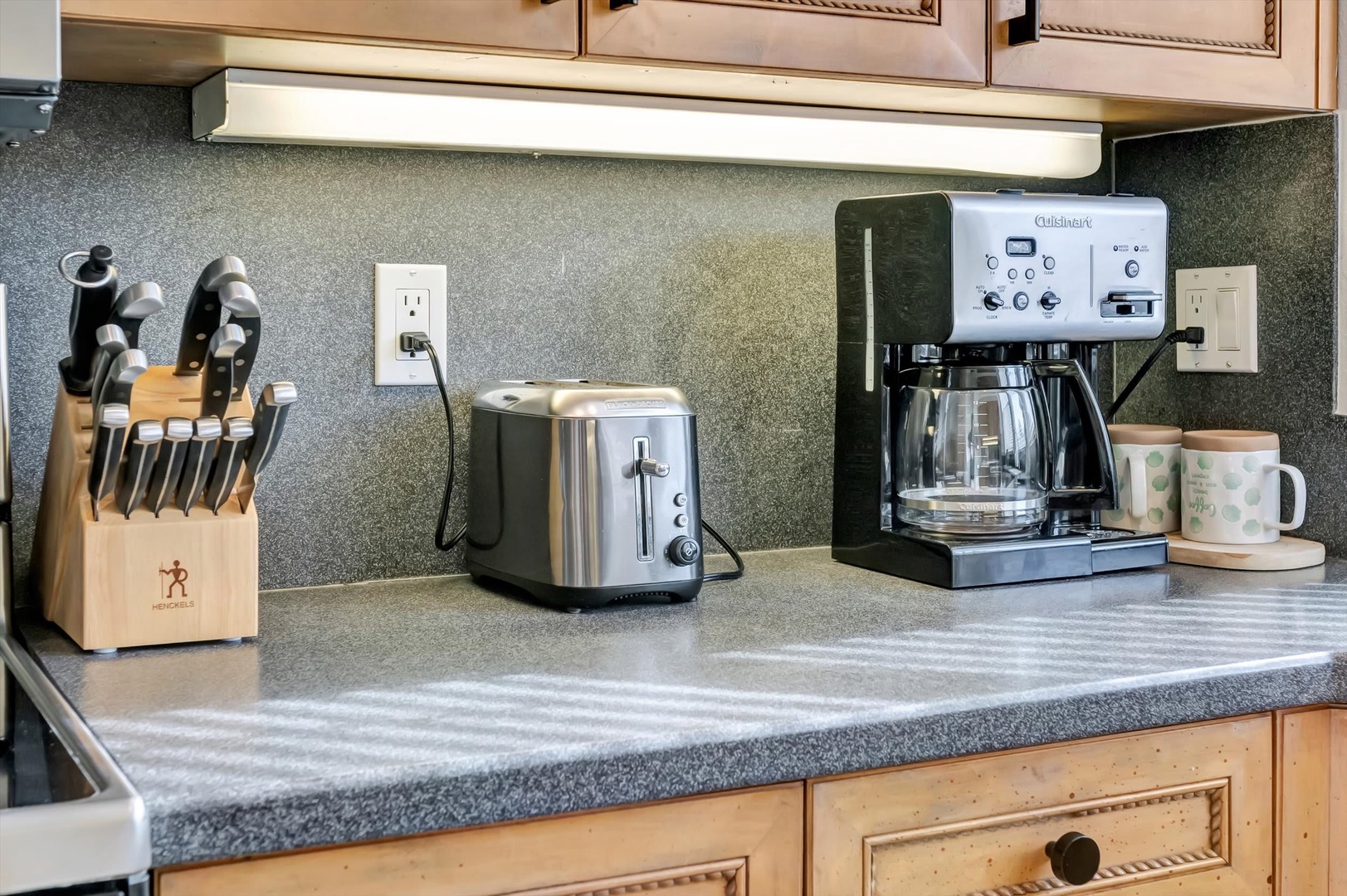 Start your mornings right with a full coffee setup and everything you need to prepare meals in this well-equipped kitchen. Fresh coffee, toasted bagels, and leisurely breakfasts await.