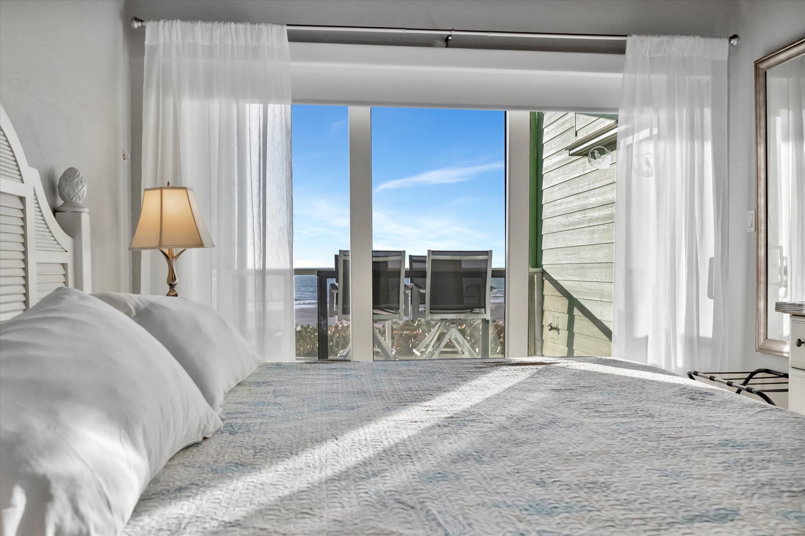 Wake up to soft coastal light and the soothing sound of waves just beyond your balcony. Your tranquil oceanfront escape awaits.