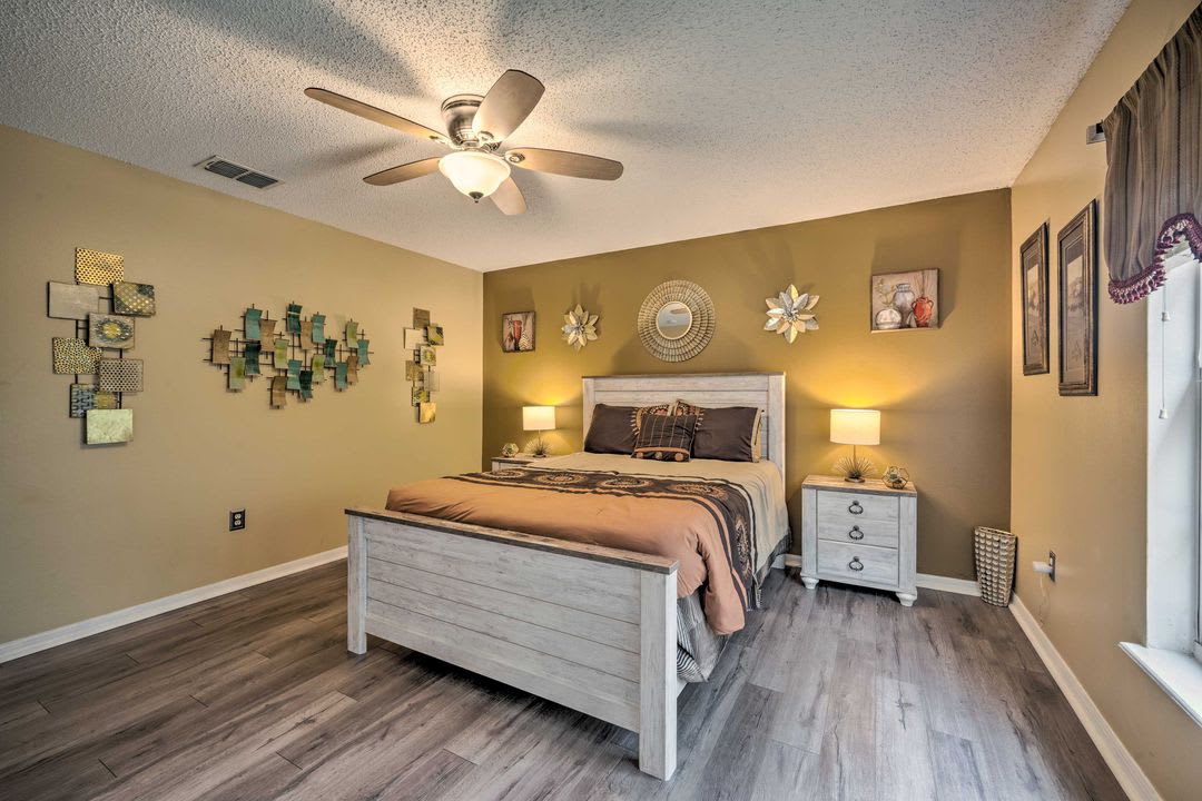 Unwind in your cozy bedroom, complete with stylish décor, warm lighting, and a ceiling fan to keep you comfortable year-round.