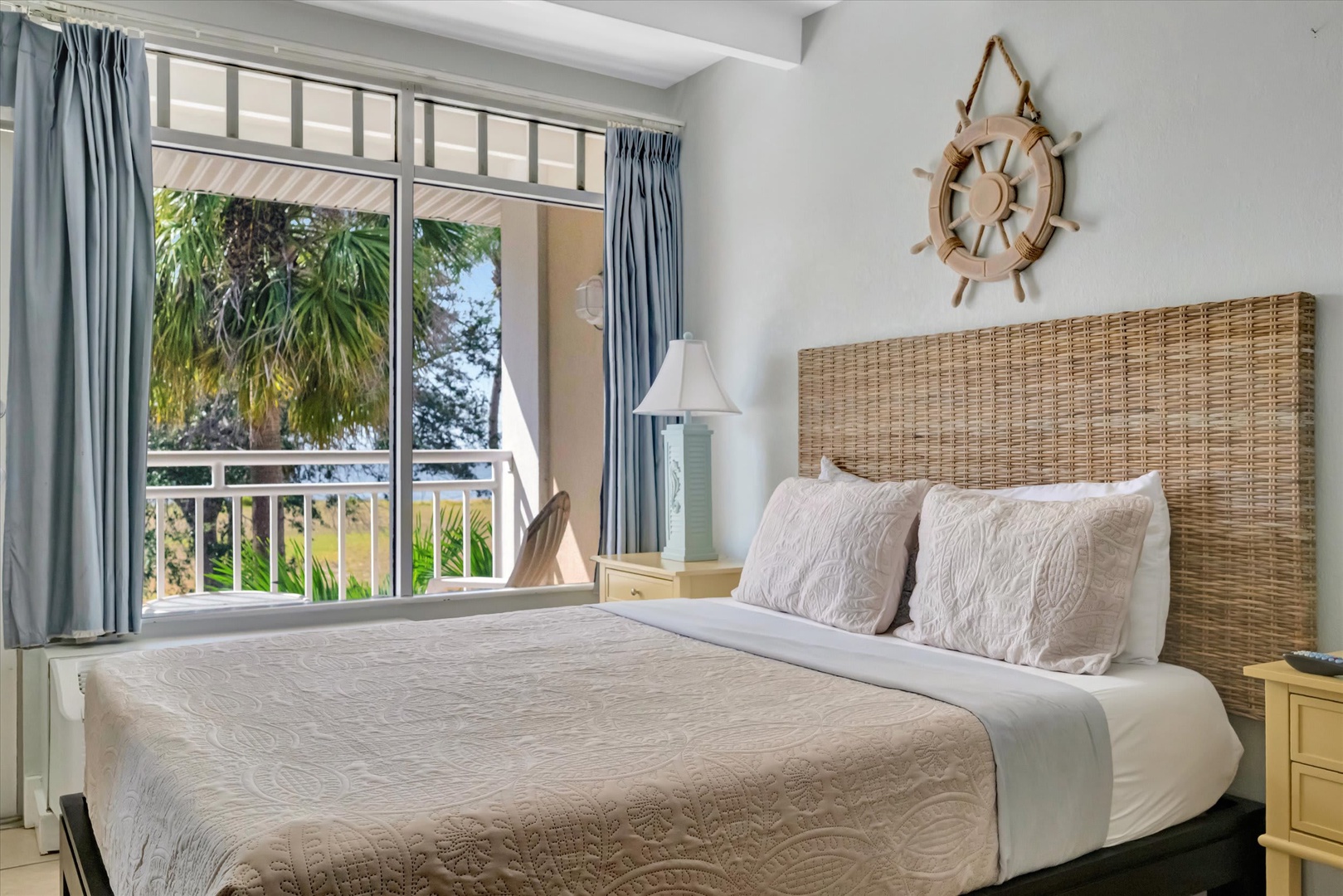 Wake up to palm trees swaying just beyond your balcony and a coastal-inspired bedroom designed for total relaxation. Soft linens and nautical touches help you unwind.