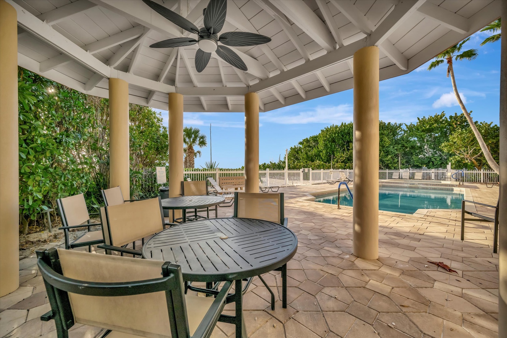 Relax under your private poolside pavilion with ceiling fan and tropical breezes. Perfect for lazy afternoons, morning coffee, or enjoying the Florida sunshine—your personal oasis awaits.