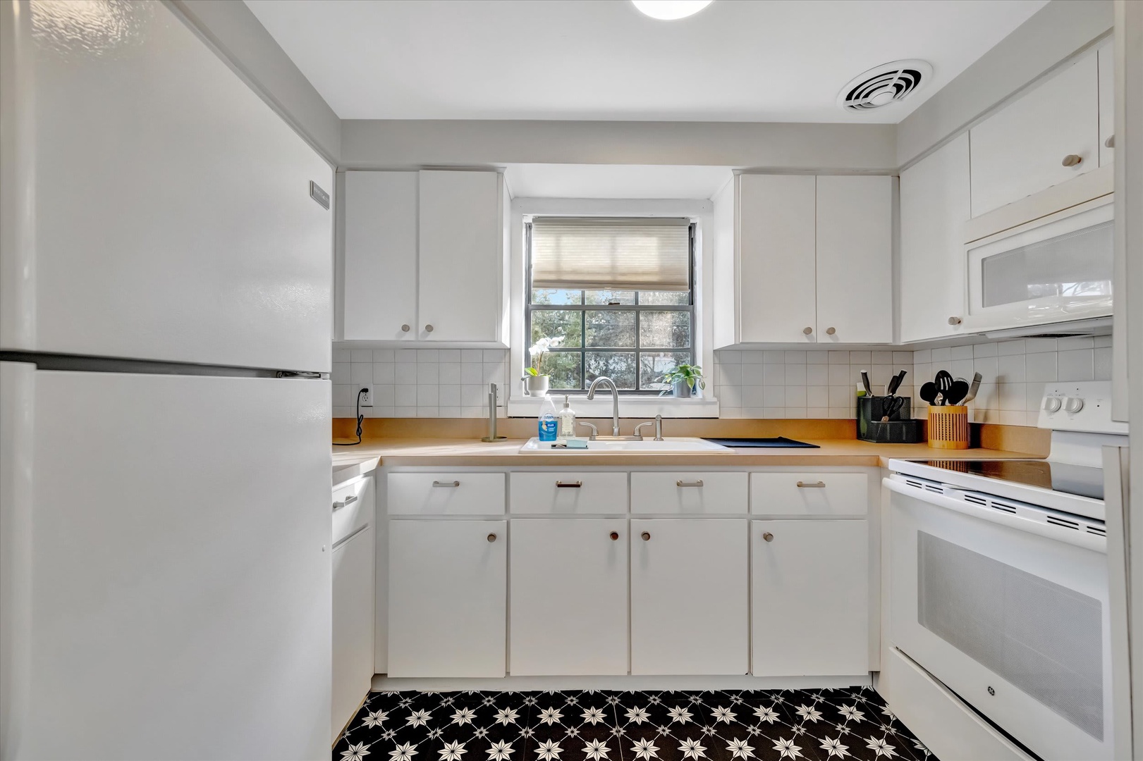 Your bright, fully equipped kitchen has everything you need to prepare meals at your leisure, from a full-size fridge to a convenient oven and stove.