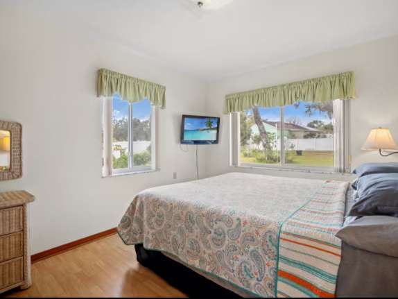 Wake up to natural light streaming through your windows and enjoy peaceful garden views from your comfortable bedroom retreat.