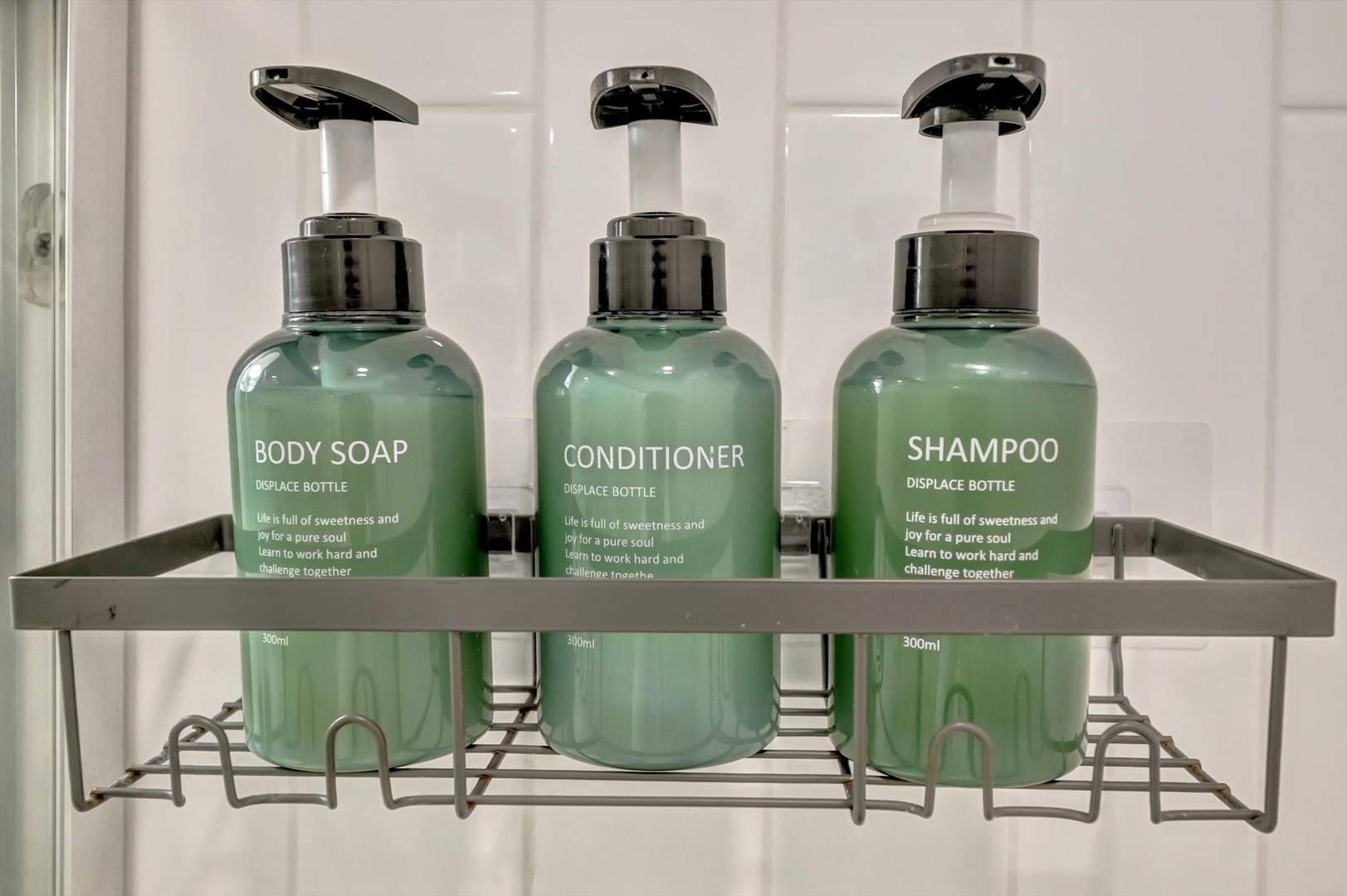 Your shower is stocked with eco-friendly body soap, conditioner, and shampoo, all thoughtfully arranged in refillable bottles for your convenience.
