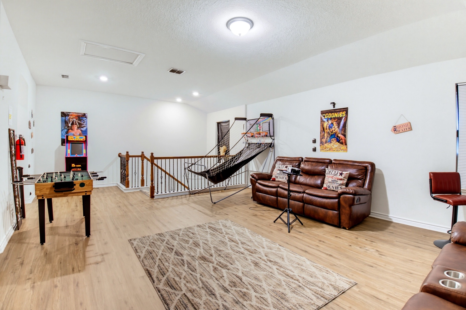 Your own game room awaits—shoot hoops, play foosball, and unwind on plush leather seating. It's where fun and relaxation come together effortlessly.
