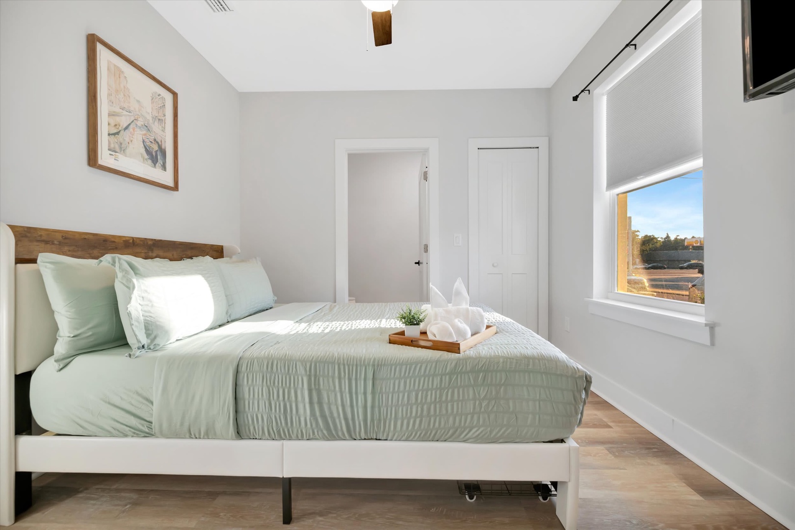 Wake up to soft morning light streaming through your window and a peaceful view that makes every sunrise feel special. This cozy bedroom invites you to unwind in tranquil style.