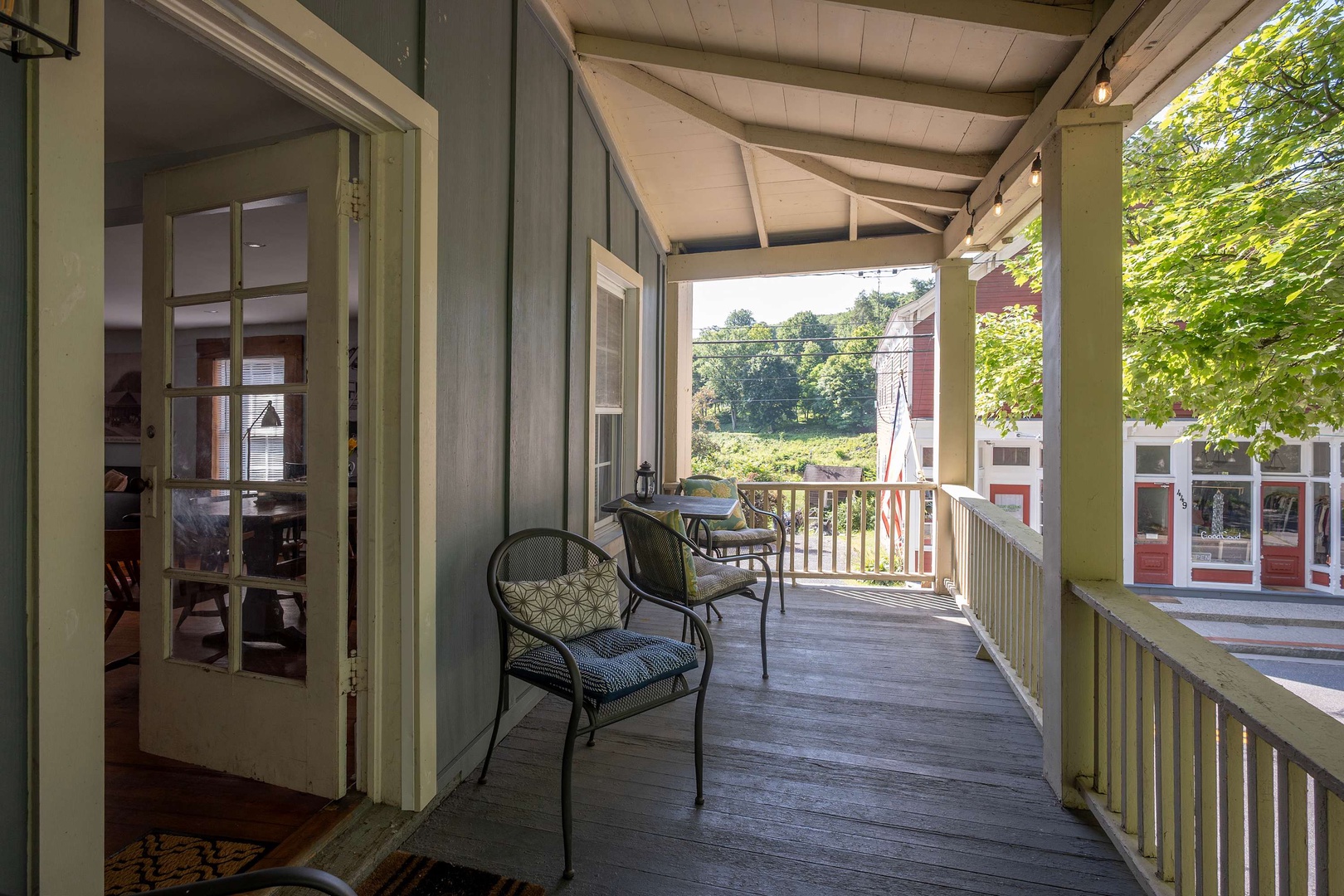 Step out onto your private porch and settle into a quiet moment surrounded by leafy trees and peaceful countryside views. Perfect for morning coffee or evening relaxation.