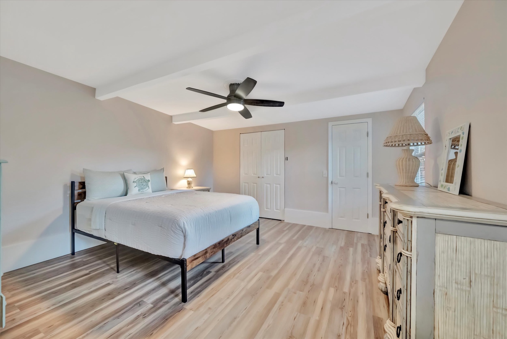 Your peaceful retreat awaits with plush bedding, vaulted ceilings, and coastal-inspired décor that creates a serene escape after your day's adventures.