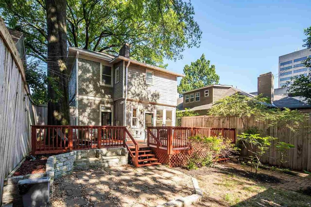 This charming rental is nestled in a quiet urban neighborhood with mature trees and private backyard space, offering you a peaceful retreat while staying close to the city.